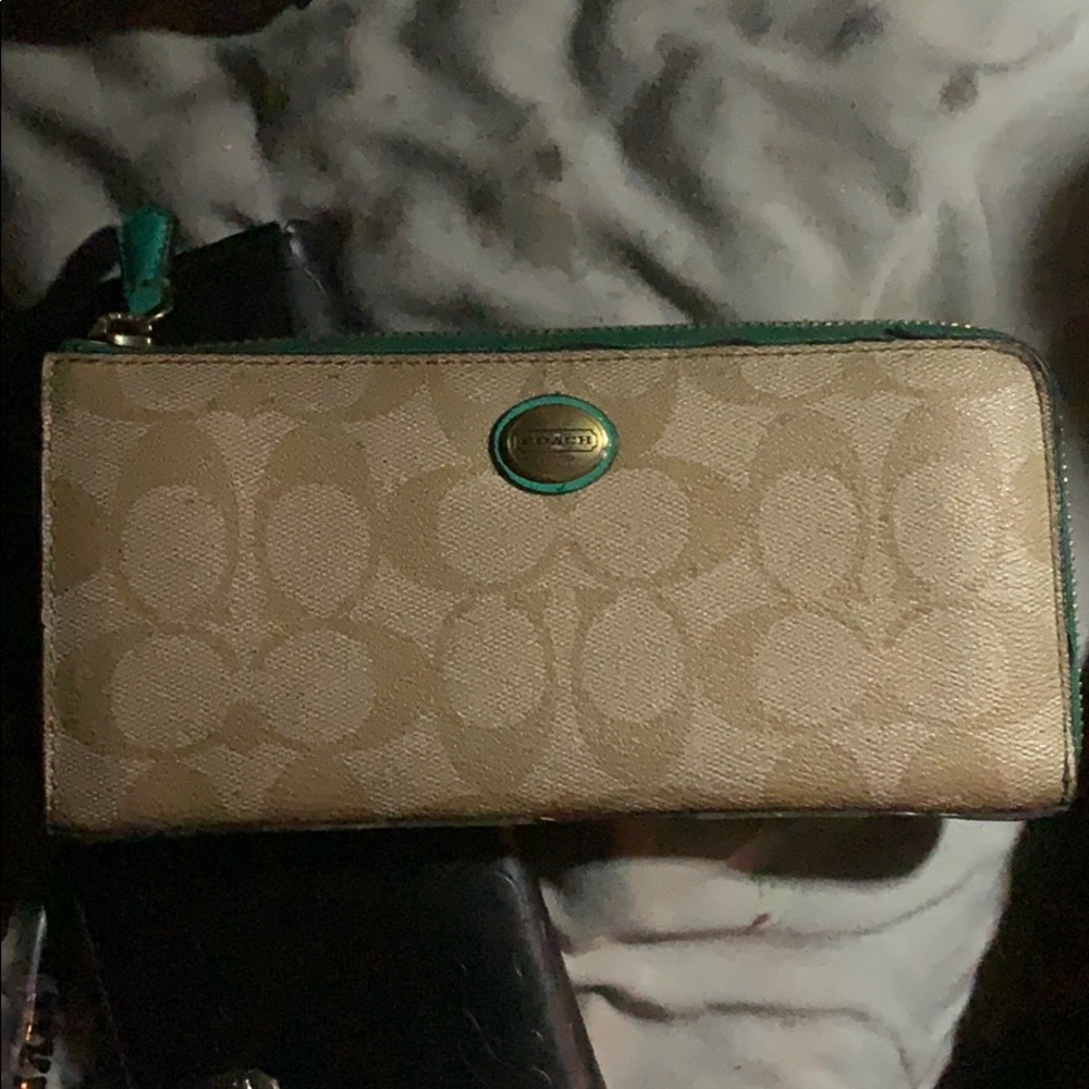 A lightly used coach female wallet!